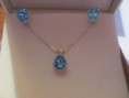 Genuine blue topaz necklace and earrings set in 925 sterling silver